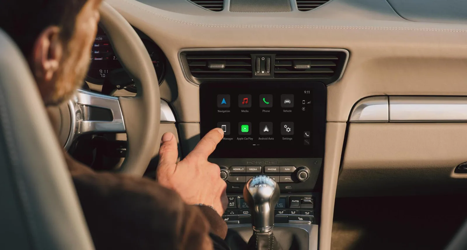 Porsche представила беспроводной CarPlay для «будущей классики» — 911, Boxster и Cayman