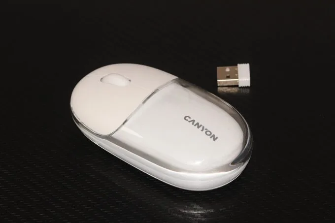 Canyon OnClick 24. Мишка в напіврозорому корпусі