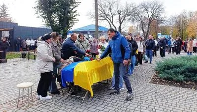 Глобинська громада провела в останню земну дорогу двох полеглих Захисників