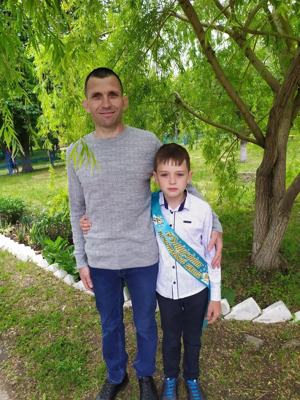 Микола Головний із сином Сергієм. Фото з архіву родини